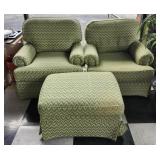 Pair of green lounge chairs and ottoman