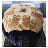 Black and tan decorative ottoman