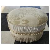 Tan oval decorative ottoman