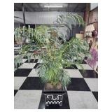 Black and white mosaic planter with faux plant