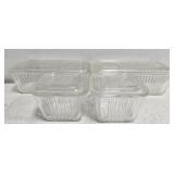 Set of 4 clear glass containers