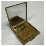 Very elegant golden color powder mirror