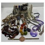 Box of costume jewelry and caddy