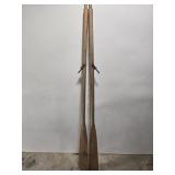 Pair of brown oars with locks