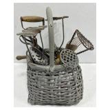 Basket of vintage kitchen utensils