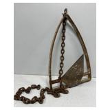 Old unique boat anchor with chain
