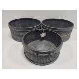 3 round metal containers