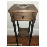 Small wooden side table with glass piece