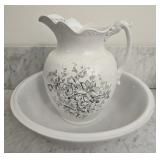 White ceramic pitcher and bowl