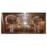Shelf lot of pink depression glass