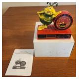Vintage raid bug clock radio