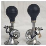 Two vintage car horns