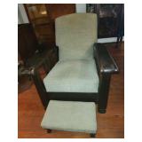 Large wooden & upholstered arm chair & footstool