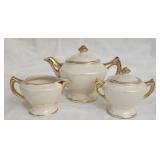 Opalescent teapot and cream and sugar set