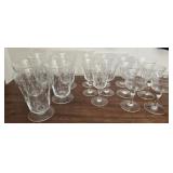 Partial set of etched glass stemmed cups