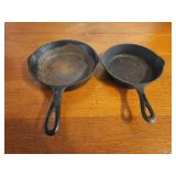 2 cast iron pans