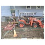 Kubota LA272 B7500 tractor with attachment
