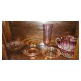 Shelf lot of pink depression glass