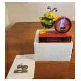 Vintage raid bug clock radio