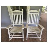 Pair of white wood rocking chairs