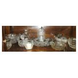 Shelf lot of crystal glasses and more