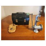 Vintage lunchbox and metal meat grinder