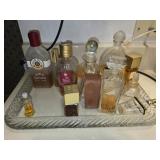Glass tray of perfume and more