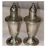 Weighted sterling silver salt and pepper shakers