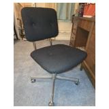 Black roll around chair