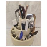 Swivel kitchen utensil holder