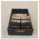 Pair of sterling silver circular napkin holders