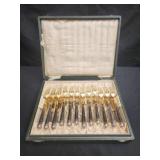 24 Silver and gold plated forks and knives