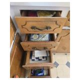 4 drawers of oven mitts and more