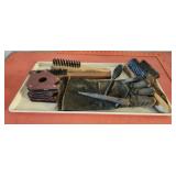 Tray lot of gloves brushes and more SEE DESC