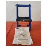 OTC clamshell strut tool