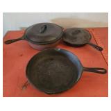 3 cast iron skillets 2 lids
