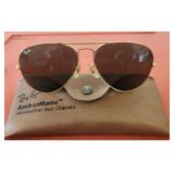 Pair of rayban all weather sunglasses with case