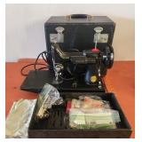 Featherweight singer sewing machine& accessories