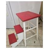 Red and white step ladder