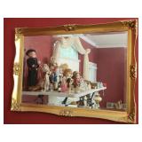 Gold framed hanging mirror