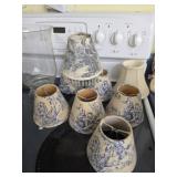 Lot of chandelier lamp shades and glass vase