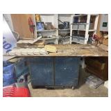 Large wood and metal work table with tin and wood