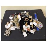 Estate lot of costume jewelry broaches and more