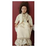 Sitting Victorian style doll