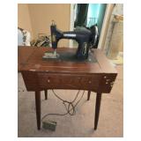 Kenmore sewing machine in wood cabinet