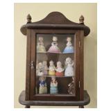 Small cabinet bell figurines