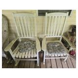 Pair of white wood rocking chairs