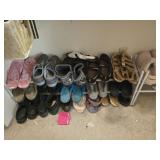 Estate lot of shoes and racks