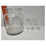 Group of glass Canisters 1 has a chip