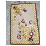 Throw rug with flowers